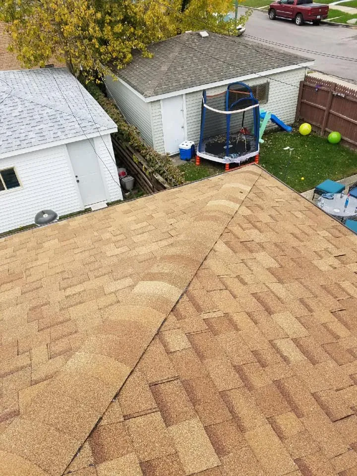 close up to asphalt shingles after roof repair service